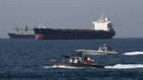 Tanker digambarkan di jalan Hormuz - jalur air yang penting secara strategis yang memisahkan Iran, Oman dan Uni Emirat Arab.