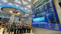 Hari Pertama IPO, Harga CDIA dan COIN Melonjak, Apakah Wajib Beli?